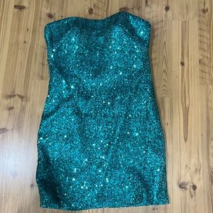 Green, strapless sequin dress